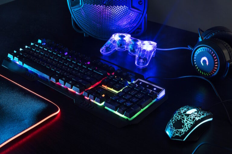 view illuminated neon gaming keyboard setup controller 768x513